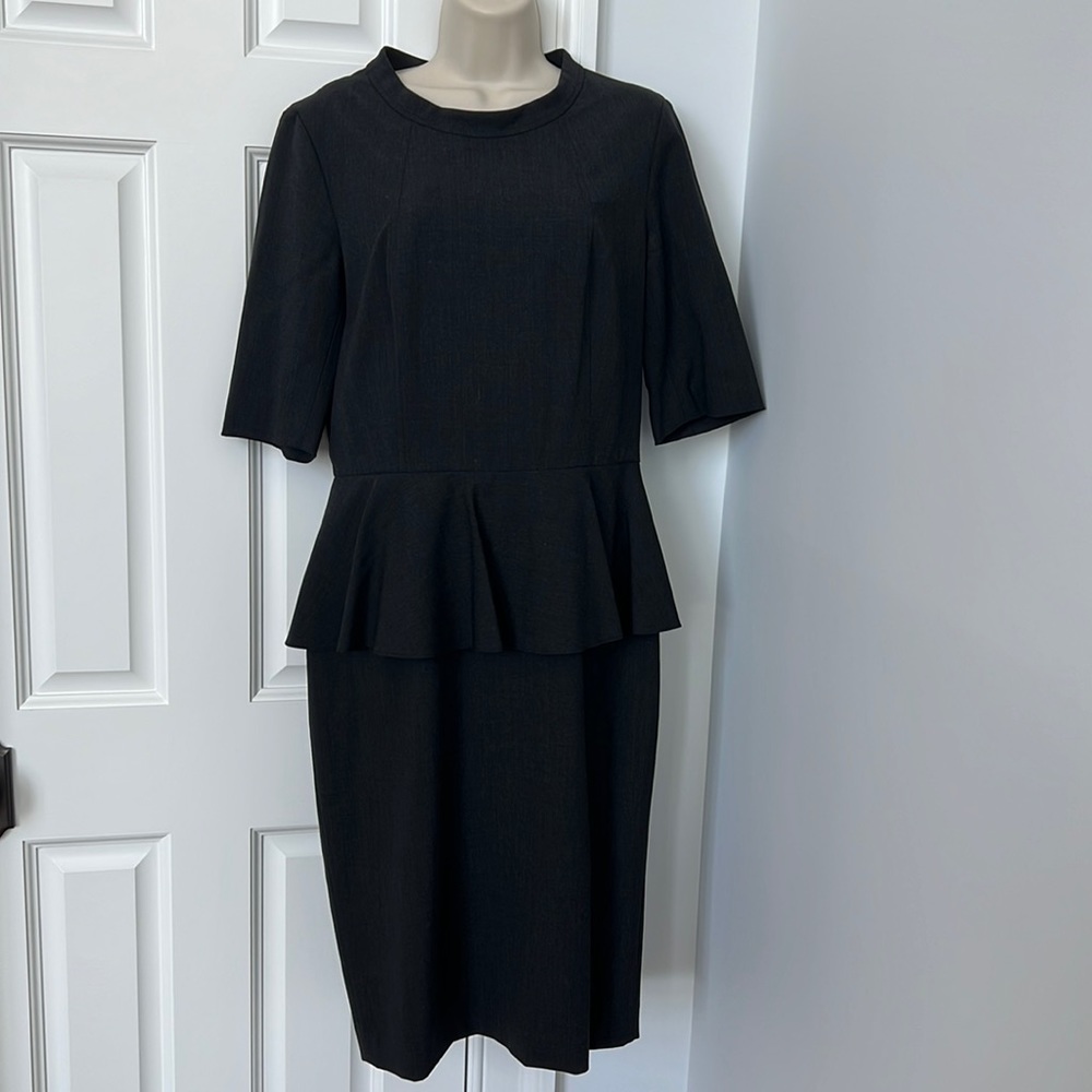 Very flattering grey career/ office dress.